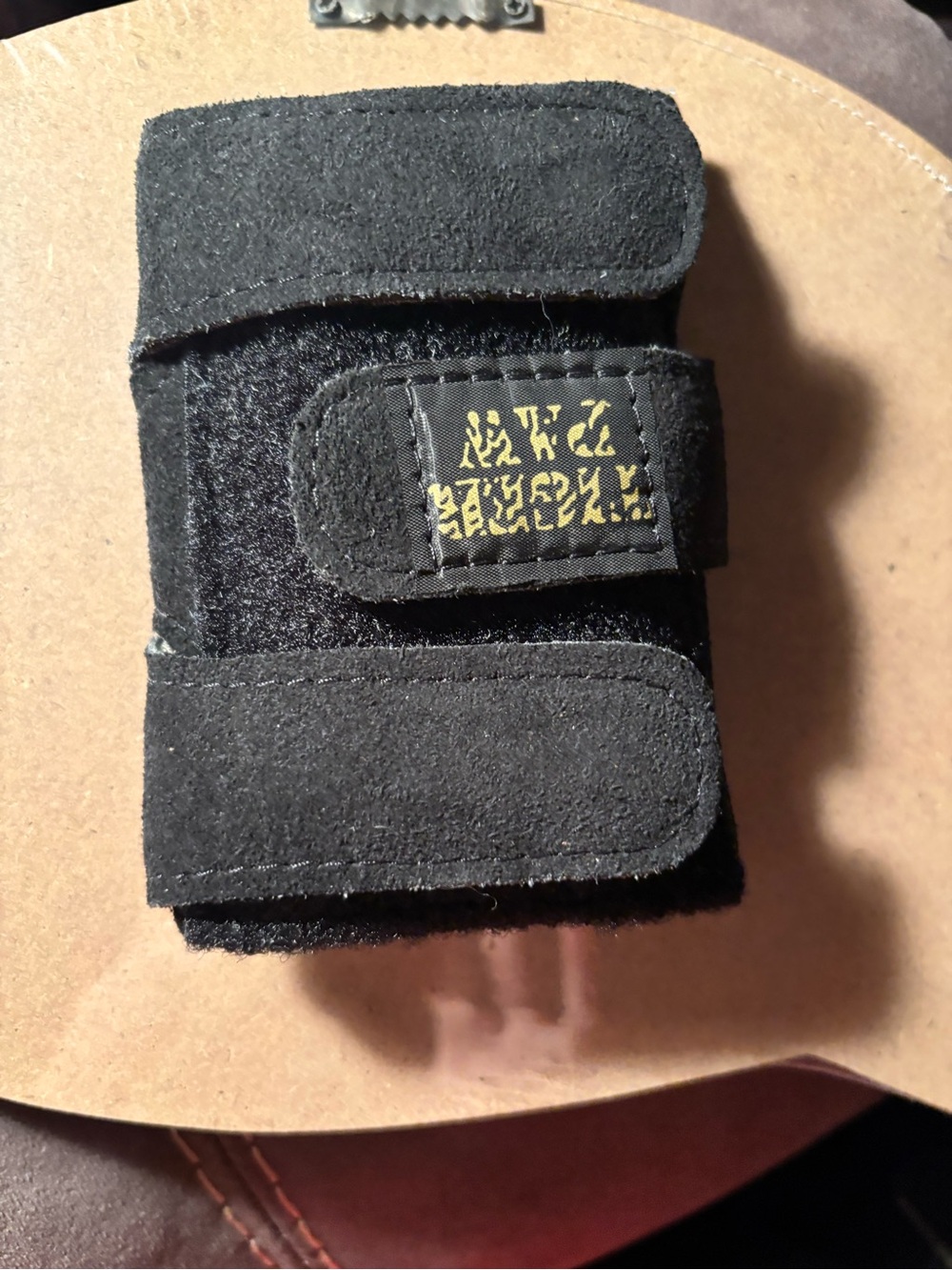 Black Adjustable Wrist Support Wrap with Secure Hook-and-Loop Straps